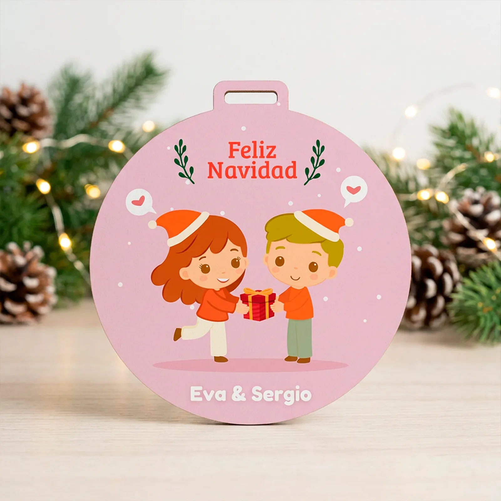 Adorno navideño personalizado con niño y niña y nombres