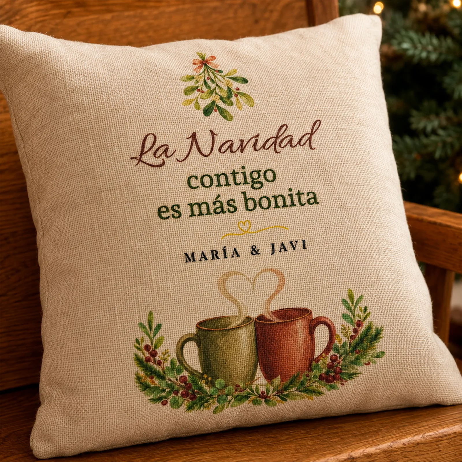 Detalle del cojín navideño para parejas personalizado con dos nombres
